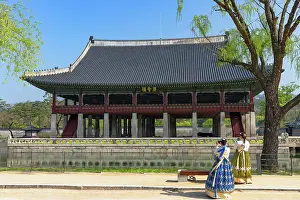 Clothing Prints: Women wearing traditional hanbok dresses in front of Gyeonghoeru Pavilion inside Gyeongbokgung Palace