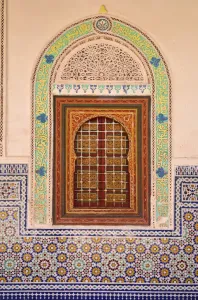 Shrine Collection: Wood carving and stucco work in a window at the Zaouia Naciri in Tamegroute. Zagora region
