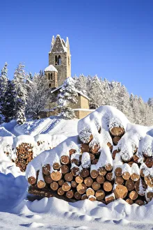 Canton Graubunden Prints: Wood covered in snow near the church of San Gian
