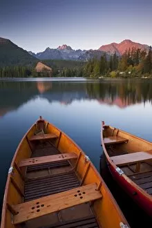 Serene Landscapes Gallery: Wooden boats on Strbske Pleso lake in the Tatra Mountains of Slovakia, Europe. Autumn