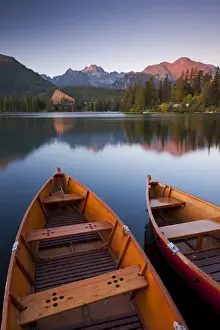 Wooden Boats Prints: Wooden boats on Strbske Pleso lake in the Tatra Mountains of Slovakia, Europe. Autumn