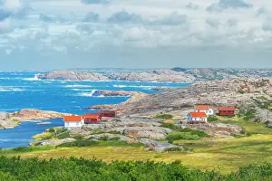 Cloudscape Prints: Wooden cottages on rocky granite rocks along the Bohuslan coast, Vastra Gotaland, Sweden
