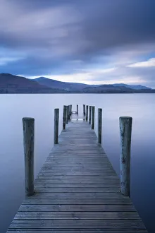 November Prints: Wooden jetty on Derwent Water in the Lake District, Cumbria, England. Autumn (November)