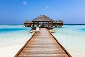 Wooden jetty on a tropical island, Maldives