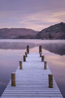 Images Dated 23rd February 2021: Wooden jetty on Ullswater at dawn on a frosty winter morning, Lake District, Cumbria