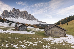 Funes Prints: Two wooden lodges and Odle Dolomites