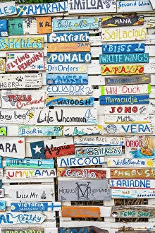 Images Dated 5th April 2023: Wooden plaques of visiting boats to the Paradise Beach Club, Carriacou Island, Grenada, Caribbean