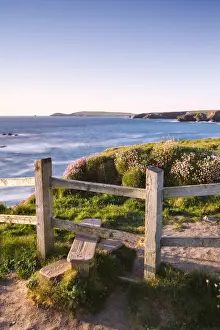 Trevose Head Prints: Wooden stile on Cornish clifftops near Porthcothan Bay with views to Trevose Head