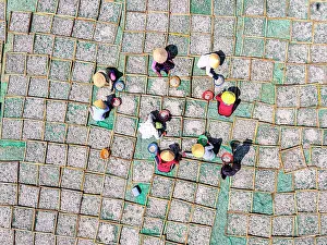 Straight Down Prints: Workers drying anchovies on wooden racks, Tuy An, Phu Yen Province, Vietnam