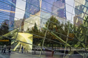 One world trade centre reflected in the September 11 Memorial museum, New York, USA