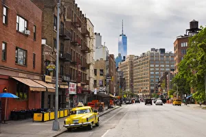 Chelsea Prints: World trade centre towering over the west village, New York, USA