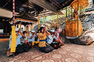 Images Dated 28th February 2023: Worshipers praying in the cave, Goa Giri Putri temple, Nusa Penida, Bali, Indonesia