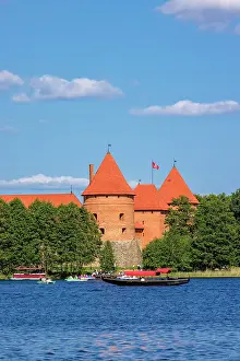 Brick Gothic Prints: Yacht in front of Trakai Island Castle, Trakai, Lithuania