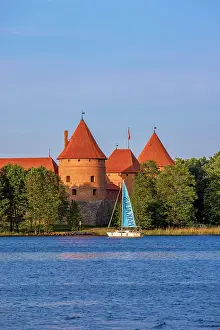 Brick Gothic Prints: Yacht in front of Trakai Island Castle, Trakai, Lithuania