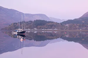 Images Dated 18th May 2016: Yachts moored on a mirror still Loch Leven during twilight, Glencoe, Highland, Scotland