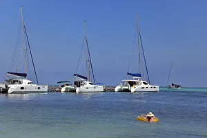 Yachts moored at San Pedro, Ambergris Caye, Caribbean, Central America Yachts moored at San Pedro, Ambergris Caye, Caribbean, Central America