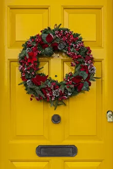 Yellow door and Christmas Wreath, Bankside, London, England, UK