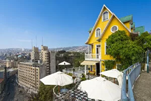 Images Dated 15th March 2022: Yellow Hotel Brighton with parasols, UNESCO, Paseo Atkinson, Cerro Alegre, Valparaiso