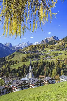 Colle Santa Lucia Collection: Yellow larches color the villages of Selva of Cadore and Saint Lucia hill in autumn