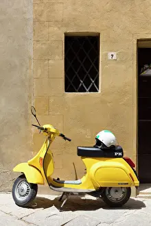 Sorrento Prints: Yellow mopel parked against a wall