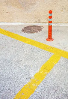 Emporio Prints: Yellow road markings and red post, Emporio, Santorini, Cyclades Islands, Greece, Europe