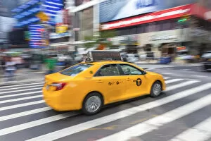 Yellow taxi, central Manhattan, New York, USA
