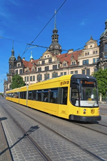 Saxony Prints: Yellow tram passing by Dresden Castle, Dresden, Saxony, Germany
