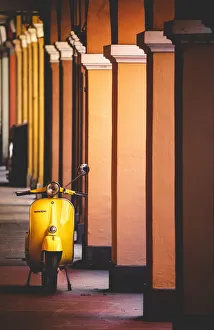Yellow Vespa in Modena historic city. Modena old town, Emilia Romagna, Italy