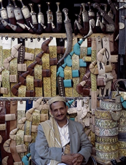 Yemeni trader sells traditional daggers at his stall