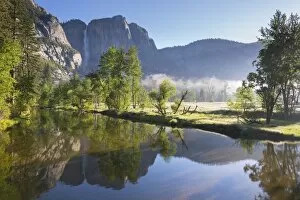 Yosemite Falls and the Merced River at dawn on a misty Spring morning, Yosemite Valley