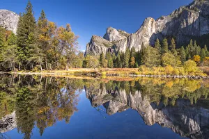 Yosemite Valley reflected in the calm waters of the River Merced at Valley View Yosemite Valley reflected in the calm waters of the River Merced at Valley View