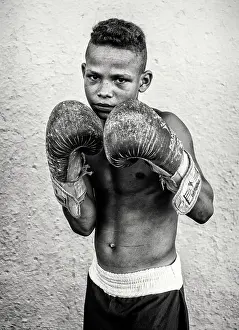 Cienfuegos Prints: Young boy wearing boxing gloves, Cienfuegos, Cuba, Caribbean