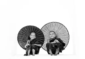 Steps Prints: Young Buddhist monks with parasols on the steps of the Hsinbyume Pagoda