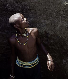 Tribal Jewellery Collection: Young Datoga man in a well