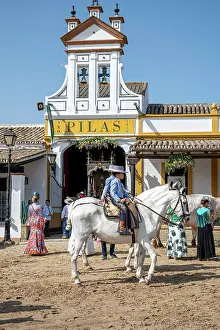 Rocio Prints: Young horse riders in front of the Hermandad (Confraternity) de Pilas house